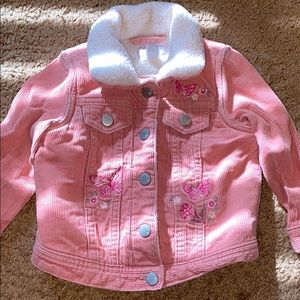 Toddler Cozy pink jacket.